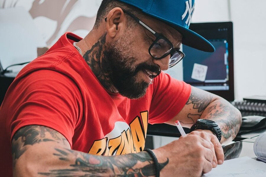 Designer creating art on a notepad